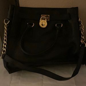 Michael Kors black purse and matching wallet